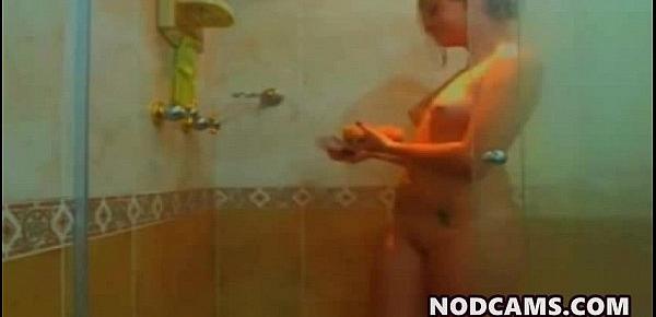  Long haired blondie washin her body on cam